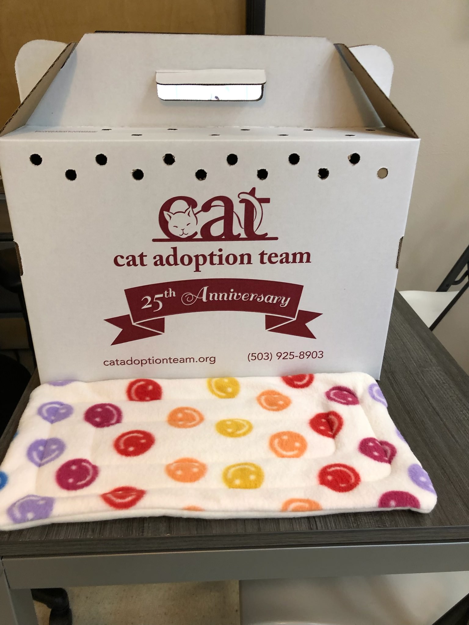 Handmade fabric pad for cat carriers, sewn by Columbia River Sewing members for Portland’s Cat Adoption Team.